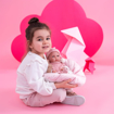 Слика на Бебе Bimba со розово перниче, облека и капичка, 35 cm  (без звуци) - Llorens Dolls