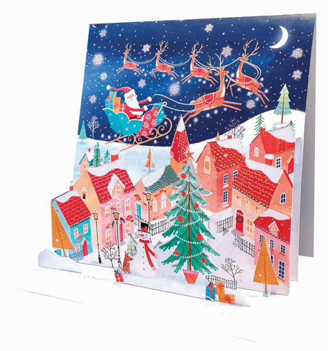 Слика на Новогодишна 3Д честитка ДЕДО МРАЗ ЛЕТА НАД ГРАДОТ - Pictura