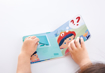 Слика на Сет за игра со пожарникарско возило, фигури и книга, 4 делови – Hape